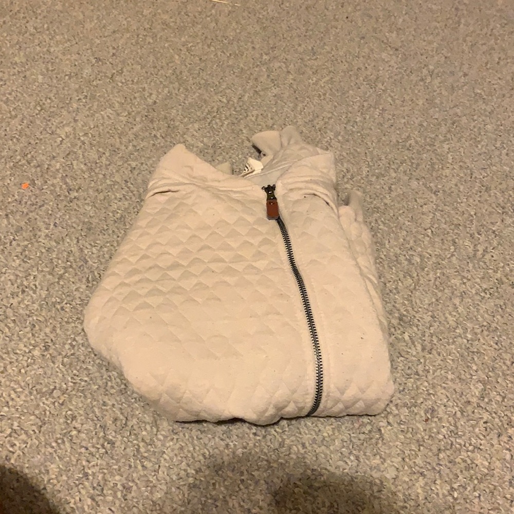 A large brown jacket with pockets from RED